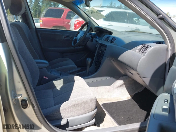 2000 Toyota Camry CE with VIN JT2BG22K6Y0451632, listed as a IAAI auction lot 42030842 with 200,734 mi miles. Bid and sale history available at carsss.com. Image 5.