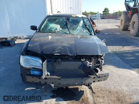 2015 Chrysler 300 Limited with VIN 2C3CCAAGXFH779843, listed as a IAAI auction lot 40284433 with 251,182 mi miles and . Bid and sale history available at DreamBid. Image 13.