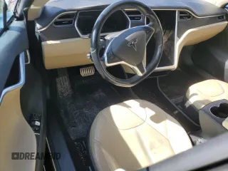 2014 Tesla Model S 60 with VIN 5YJSA1H10EFP34137, listed as a Copart auction lot 47645795 with Not provided miles and Salvage title. Bid and sale history available at DreamBid. Image 8.