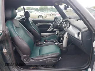 2005 MINI Convertible with VIN WMWRF33495TG11818, listed as a IAAI auction lot 42351446 with 100,033 mi miles and . Bid and sale history available at DreamBid. Image 5.