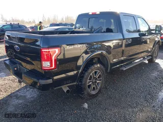2015 Ford F-150 XLT w/HD Payload Pkg with VIN 1FTFW1EG5FFC13942, listed as a IAAI auction lot 41392709 with 196,416 mi miles. Bid and sale history available at carsss.com. Image 4.