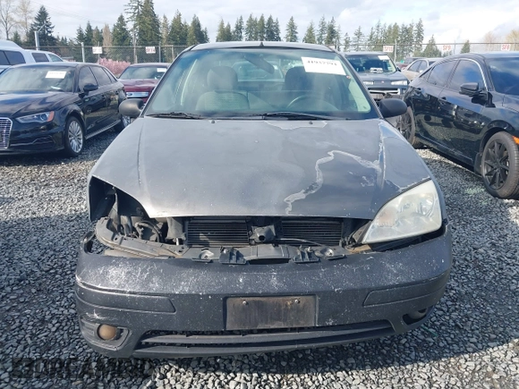 2006 Ford Focus S z VIN 1FAFP34NX6W179320, wystawiony jako IAAI lot #41937794 z przebiegiem 211 961 mil mil oraz . Historia ofert i sprzedaży dostępna na DreamBid. Obrazek 11.