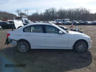 2014 BMW 3 Series 335i xDrive with VIN WBA3B9C52EJ466045, listed as a IAAI auction lot 41281384 with 136,329 mi miles. Bid and sale history available at carsss.com. Image 13.