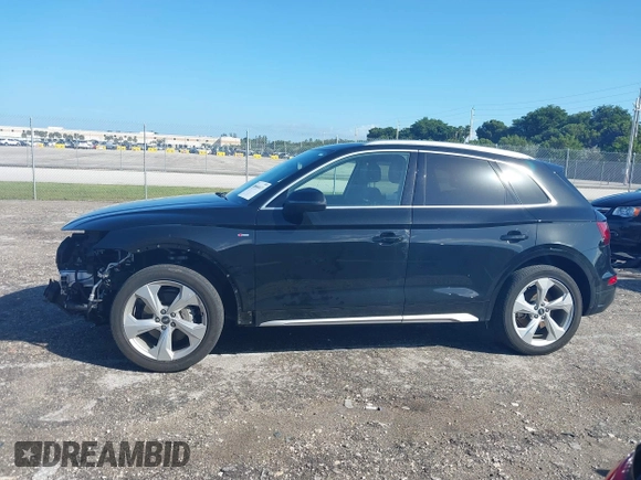 2023 Audi Q5 S line Premium Plus z VIN WA1EAAFY5P2128250, wystawiony jako IAAI lot #40666613 z przebiegiem 27 940 mil mil oraz . Historia ofert i sprzedaży dostępna na DreamBid. Obrazek 15.