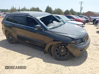 2016 Jeep Grand Cherokee Overland z VIN 1C4RJFCG5GC408390, wystawiony jako IAAI lot #42140038 z przebiegiem 140 507 mil mil oraz . Historia ofert i sprzedaży dostępna na DreamBid. Obrazek 1.