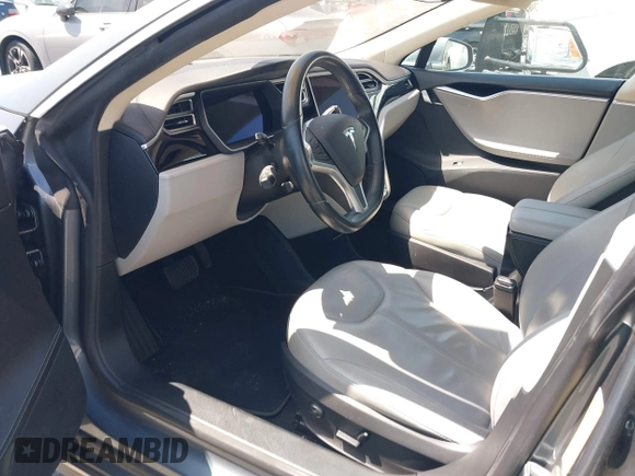 2014 Tesla Model S 60 z VIN 5YJSA1S16EFP40968, wystawiony jako IAAI lot #42331754 z przebiegiem 159 717 mil mil oraz . Historia ofert i sprzedaży dostępna na DreamBid. Obrazek 5.