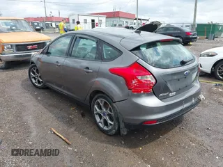 2014 Ford Focus SE with VIN 1FADP3K28EL337377, listed as a IAAI auction lot 41962856 with 137,906 mi miles. Bid and sale history available at carsss.com. Image 3.