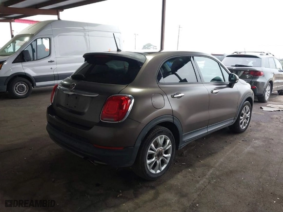 2016 FIAT 500X Easy with VIN ZFBCFXBTXGP349005, listed as a IAAI auction lot 41163593 with 69012 miles. Bid and sale history available at carsss.com. Image 4.