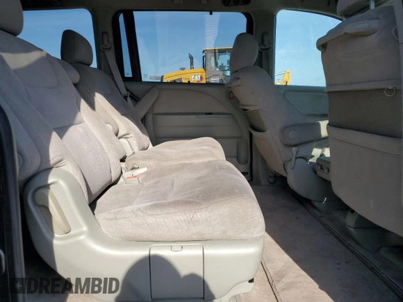 2007 Honda Odyssey EX z VIN 5FNRL38447B407130, wystawiony jako Copart lot #58394935 z przebiegiem 129 893 mil mil oraz Szkoda całkowita • Salvage title. Historia ofert i sprzedaży dostępna na DreamBid. Obrazek 11.