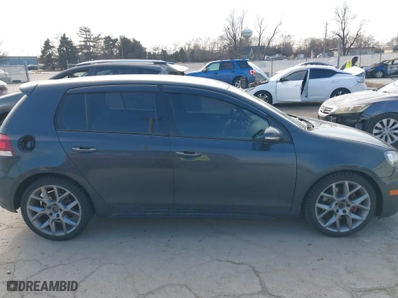 2013 Volkswagen GTI with VIN WVWHV7AJ2DW129476, listed as a IAAI auction lot 41716090 with 132,996 mi miles. Bid and sale history available at carsss.com. Image 14.