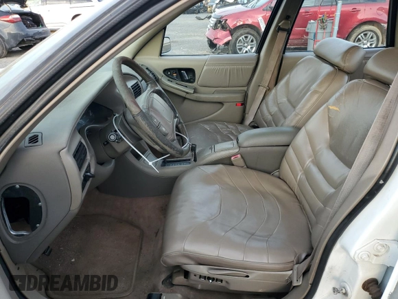 1996 Buick Regal with VIN 2G4WF52KXT1512650, listed as a Copart auction lot 79048884 with 225,558 mi miles and Salvage Title. Bid and sale history available at DreamBid. Image 7.