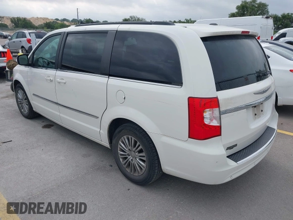 2013 Chrysler Town & Country Touring-L with VIN 2C4RC1CG2DR508799, listed as a IAAI auction lot 42092504 with 140,775 mi miles. Bid and sale history available at carsss.com. Image 3.