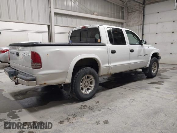 2001 Dodge Dakota Sport with VIN 1B7HG2AN31S229220, listed as a IAAI auction lot 42100843 with 134,034 mi miles. Bid and sale history available at carsss.com. Image 4.