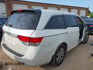 2015 Honda Odyssey EX-L z VIN 5FNRL5H61FB055684, wystawiony jako IAAI lot #42013480 z przebiegiem 221 381 mil mil oraz . Historia ofert i sprzedaży dostępna na DreamBid. Obrazek 4.