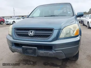 2005 Honda Pilot EX-L with RES with VIN 2HKYF18605H514327, listed as a IAAI auction lot 41563556 with 185,572 mi miles. Bid and sale history available at carsss.com. Image 6.