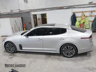 2018 Kia Stinger Premium with VIN KNAE25LA6J6021819, listed as a IAAI auction lot 41880827 with 119,214 mi miles. Bid and sale history available at carsss.com. Image 14.