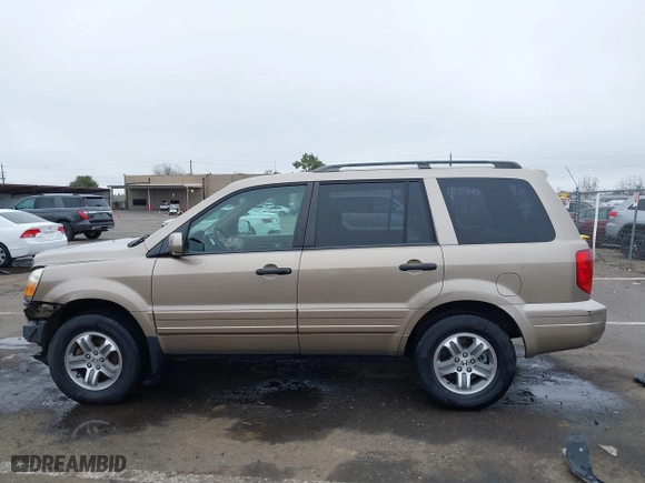 2005 Honda Pilot EX-L with NAVI with VIN 2HKYF18775H543185, listed as a IAAI auction lot 41597576 with 163,377 mi miles. Bid and sale history available at carsss.com. Image 15.