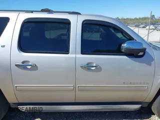 2014 Chevrolet Suburban LT with VIN 1GNSCJE06ER105294, listed as a IAAI auction lot 41687882 with 200,698 mi miles. Bid and sale history available at carsss.com. Image 13.