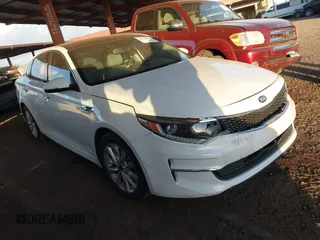 2016 Kia Optima EX with VIN 5XXGU4L30GG117411, listed as a IAAI auction lot 42034988 with 123,387 mi miles. Bid and sale history available at carsss.com. Image 1.