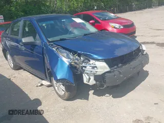 2009 Ford Focus SE z VIN 1FAHP35N39W141326, wystawiony jako IAAI lot #42201600 z przebiegiem 156 750 mil mil oraz . Historia ofert i sprzedaży dostępna na DreamBid. Obrazek 1.