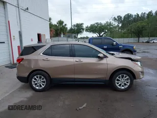 2019 Chevrolet Equinox LT z VIN 2GNAXKEV4K6259009, wystawiony jako IAAI lot #42148297 z przebiegiem 47 897 mil mil oraz . Historia ofert i sprzedaży dostępna na DreamBid. Obrazek 13.