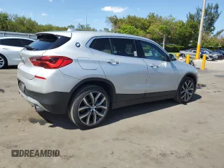 2021 BMW X2 sDrive28i z VIN WBXYH9C06M5S54903, wystawiony jako Copart lot #57177885 z przebiegiem 106 563 mil mil oraz Tytuł czysty. Historia ofert i sprzedaży dostępna na DreamBid. Obrazek 3.