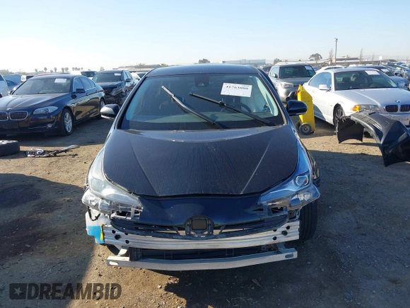 2021 Toyota Prius L Eco z VIN JTDKAMFU1M3134107, wystawiony jako IAAI lot #41763080 z przebiegiem 185 248 mil mil oraz . Historia ofert i sprzedaży dostępna na DreamBid. Obrazek 13.