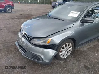 2014 Volkswagen Jetta SE with VIN 3VWD07AJ9EM277085, listed as a IAAI auction lot 42531957 with 171,613 mi miles and . Bid and sale history available at DreamBid. Image 6.