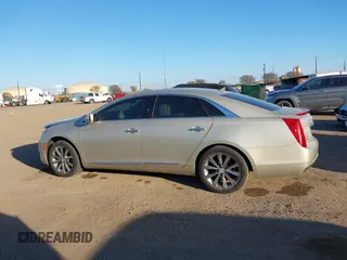 2014 Cadillac XTS with VIN 2G61L5S30E9207777, listed as a IAAI auction lot 41202654 with 112,565 mi miles. Bid and sale history available at carsss.com. Image 14.