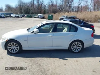 2011 BMW 3 Series 328i with VIN WBAPH7C59BE461739, listed as a IAAI auction lot 41759267 with 192,266 mi miles. Bid and sale history available at carsss.com. Image 14.