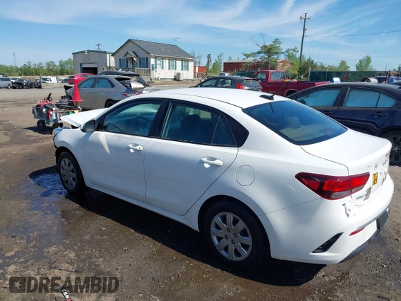 2022 Kia Rio S with VIN 3KPA24AD7NE492807, listed as a IAAI auction lot 42050520 with 100,756 mi miles. Bid and sale history available at carsss.com. Image 3.