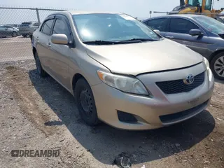 2009 Toyota Corolla with VIN 1NXBU40E69Z002692, listed as a IAAI auction lot 41942713 with 127,609 mi miles. Bid and sale history available at carsss.com. Image 1.