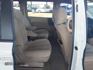 2007 Kia Sedona EX with VIN KNDMB233276111265, listed as a IAAI auction lot 41973188 with 197,754 mi miles. Bid and sale history available at carsss.com. Image 8.