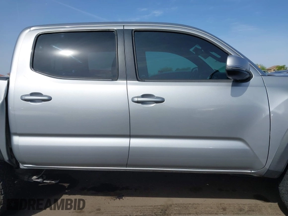 2018 Toyota Tacoma SR5 with VIN 3TMAZ5CN0JM053861, listed as a IAAI auction lot 41920377 with 104,015 mi miles and . Bid and sale history available at DreamBid. Image 13.