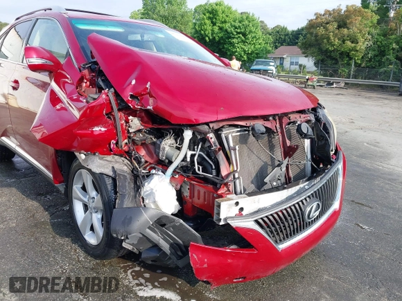 2011 Lexus RX 350 with VIN JTJZK1BA7B2004578, listed as a IAAI auction lot 42121086 with 161,990 mi miles and . Bid and sale history available at DreamBid. Image 6.
