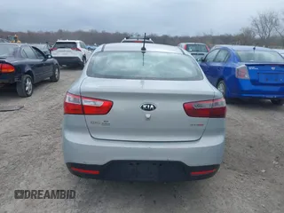 2014 Kia Rio EX with VIN KNADN4A36E6338670, listed as a IAAI auction lot 42035501 with 166,561 mi miles. Bid and sale history available at carsss.com. Image 16.
