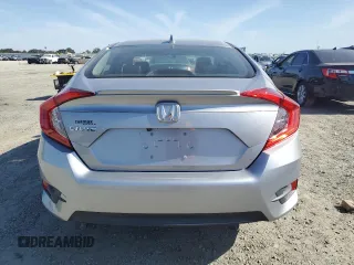 2016 Honda Civic EX-L z VIN 19XFC1F72GE219894, wystawiony jako Copart lot #58762635 z przebiegiem 104 554 mil mil oraz Szkoda całkowita • Salvage title. Historia ofert i sprzedaży dostępna na DreamBid. Obrazek 6.