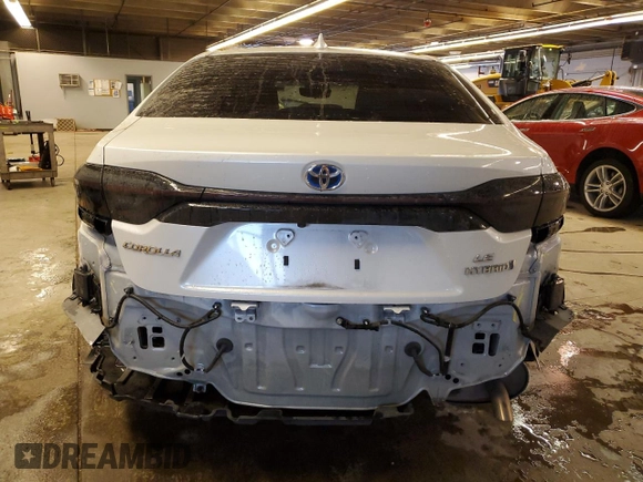 2023 Toyota Corolla Hybrid LE with VIN JTDBCMFE0PJ005942, listed as a Copart auction lot 45211345 with 30,004 mi miles and Salvage Title. Bid and sale history available at carsss.com. Image 6.