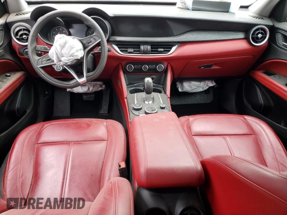2019 Alfa Romeo Stelvio z VIN ZASPAJAN0K7C71850, wystawiony jako Copart lot #54234205 z przebiegiem Nie podano mil oraz Szkoda całkowita • Salvage title. Historia ofert i sprzedaży dostępna na DreamBid. Obrazek 8.