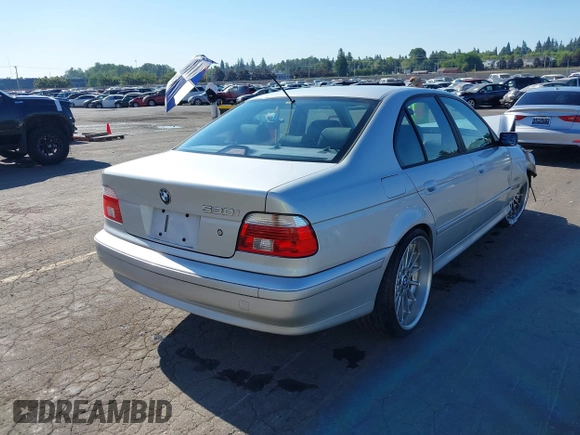 2001 BMW 5 Series 530iA with VIN WBADT63421CF02292, listed as a IAAI auction lot 39872425 with 84,778 mi miles. Bid and sale history available at carsss.com. Image 4.
