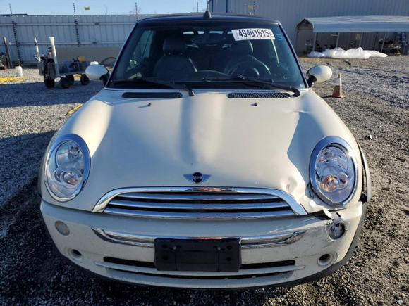2008 MINI Convertible with VIN WMWRF33588TG18353, listed as a Copart auction lot 49401615 with 124,540 mi miles and Salvage Title. Bid and sale history available at DreamBid. Image 5.