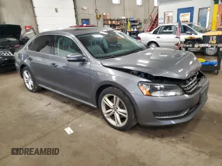 2015 Volkswagen Passat SE with VIN 1VWBV7A36FC090786, listed as a Copart auction lot 61056925 with 120,331 mi miles and Salvage title. Bid and sale history available at DreamBid. Image 4.