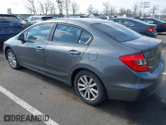 2012 Honda Civic EX-L with VIN 2HGFB2F94CH307646, listed as a IAAI auction lot 42006923 with 260,917 mi miles and . Bid and sale history available at DreamBid. Image 3.