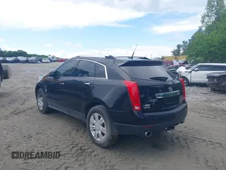 2012 Cadillac SRX Luxury Collection z VIN 3GYFNAE35CS587033, wystawiony jako IAAI lot #41628875 z przebiegiem 161 985 mil mil oraz . Historia ofert i sprzedaży dostępna na DreamBid. Obrazek 3.
