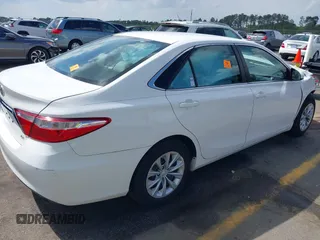 2015 Toyota Camry XLE with VIN 4T1BF1FK6FU900470, listed as a IAAI auction lot 41958737 with 76,361 mi miles. Bid and sale history available at carsss.com. Image 4.