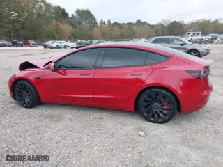 2022 Tesla Model 3 Performance with VIN 5YJ3E1ECXNF326159, listed as a IAAI auction lot 40796573 with 43,512 mi miles. Bid and sale history available at carsss.com. Image 14.