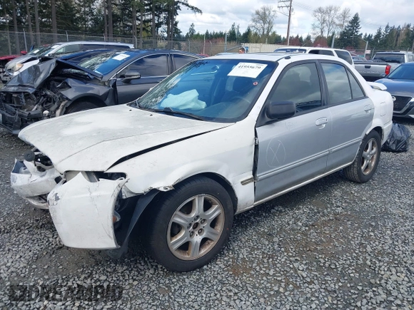 2002 Mazda Protege DX with VIN JM1BJ225520542854, listed as a IAAI auction lot 41955679 with 161,338 mi miles and . Bid and sale history available at DreamBid. Image 17.