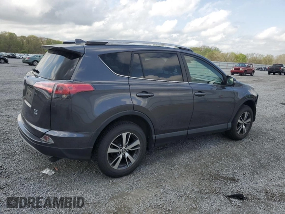 2018 Toyota RAV4 XLE with VIN JTMRFREV2JJ215776, listed as a Copart auction lot 51745205 with 52,009 mi miles and Salvage Title. Bid and sale history available at DreamBid. Image 3.