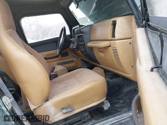 1998 Jeep Wrangler Sport with VIN 1J4FY19S9WP722431, listed as a IAAI auction lot 41872702 with 197,503 mi miles and . Bid and sale history available at DreamBid. Image 5.