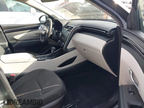 2022 Hyundai Tucson SEL with VIN 5NMJBCAEXNH031855, listed as a IAAI auction lot 41677386 with 40,606 mi miles and . Bid and sale history available at DreamBid. Image 5.